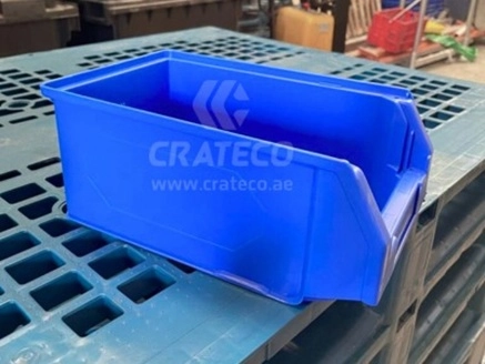 Close-up of Crateco spare parts bin showing compartments, label slot, and build quality